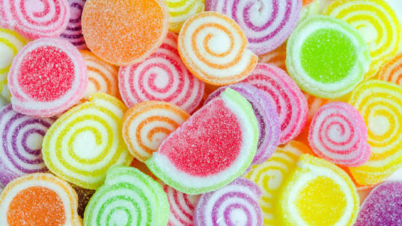 Swedish swirl candy in assorted fruit flavors, coated in sugar
